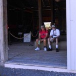 Laura and Harvey take rest break in the cool of Ike's barn